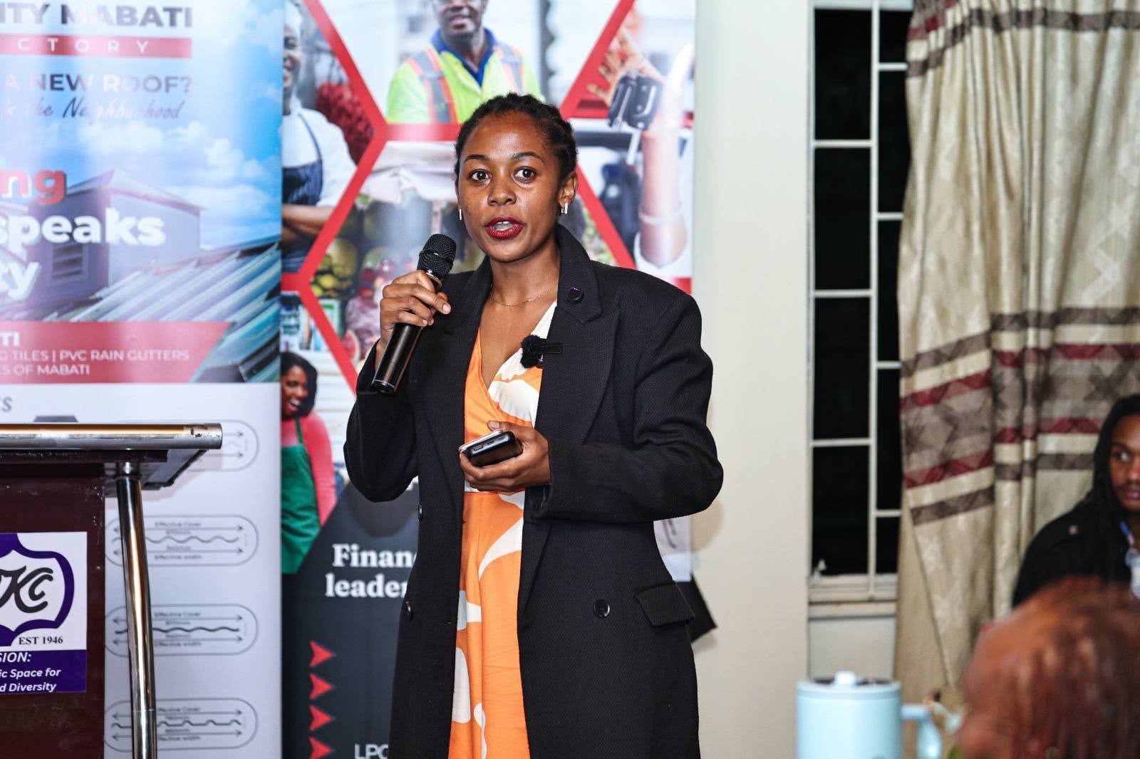Janet Gathuru speaking at a professional workshop
